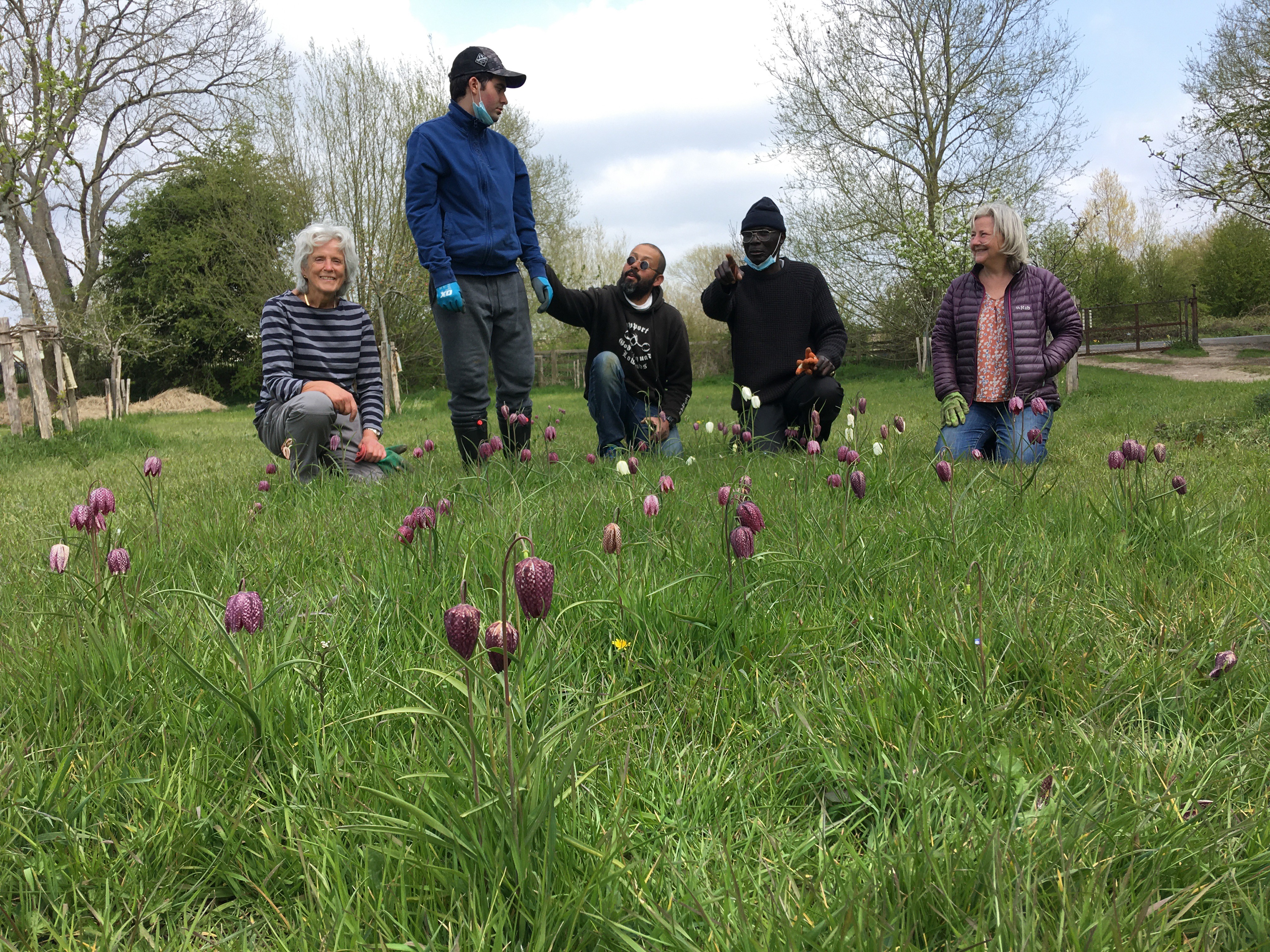 Care-farming participants and Eynsham green enthusiasts enjoying the results of autumn bulb planting